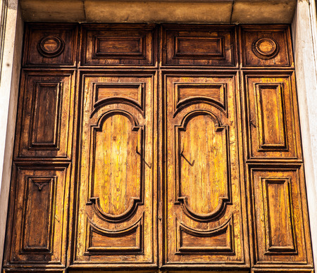 Ancient Venetian wooden door.の写真素材