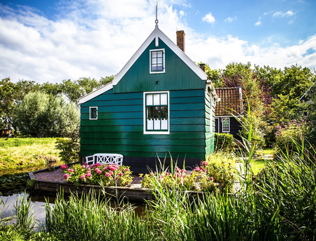 ZAANDAM, NETHERLANDS - AUGUST 14, 2016: Traditional residential Dutch buildings close-up. General landscape view of city building and traditional Dutch architecture. Zaandam - Netherlands.のeditorial素材