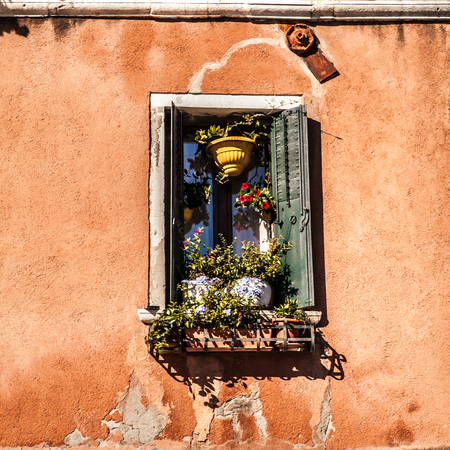 Ancient Italian traditional window.の写真素材