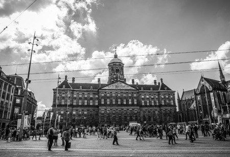 AMSTERDAM, NETHERLANDS - AUGUST 15, 2016: Famous buildings of Amsterdam city centre close-up. General landscape view of city streets and traditional Dutch architecture. Amsterdam - Netherlands.のeditorial素材