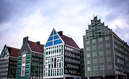 ZAANDAM, NETHERLANDS - JUNE 13, 2016: General landscape views in traditional architecture of Zaan region at twilight on 13 June in Zaandam, Holland.のeditorial素材