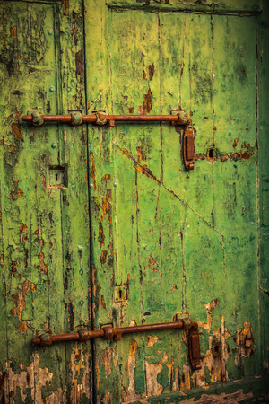 Ancient Venetian wooden door.の写真素材