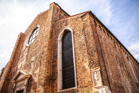 MURANO, ITALY - AUGUST 19, 2016: Famous architectural monuments and colorful facades of old medieval buildings close-up on August 19, 2016 in Murano, Italy.のeditorial素材