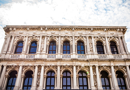 VENICE, ITALY - AUGUST 19, 2016: Famous architectural monuments and colorful facades of old medieval buildings close-up on August 19, 2016 in Venice, Italy.のeditorial素材