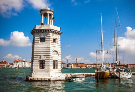 VENICE, ITALY - AUGUST 20, 2016: Famous architectural monuments and facades of old medieval buildings San Giorgio Maggiore island close-up on August 20, 2016 in Venice, Italy.のeditorial素材