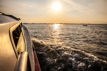 VENICE, ITALY - AUGUST 20, 2016: Vaporetto (passanger boat) at Grand Canal in Venice on August 20, 2016 in Venice, Italy.のeditorial素材