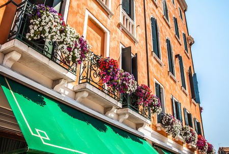 VENICE, ITALY - AUGUST 20, 2016: Famous architectural monuments and colorful facades of old medieval buildings close-up on August 20, 2016 in Venice, Italy.のeditorial素材