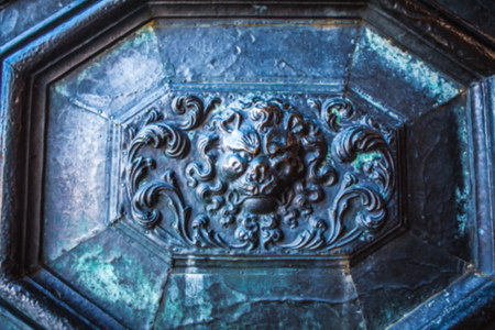 Ancient metal door blurred as background.のeditorial素材