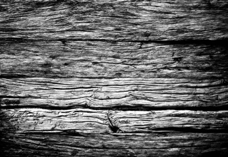 Black-white photo of wooden texture as background.の写真素材
