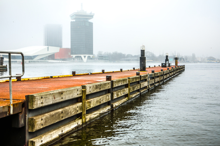 Pier of boat station in foggy day.の写真素材