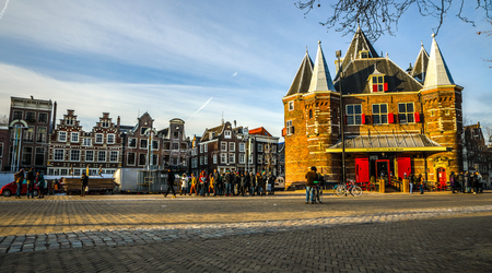 AMSTERDAM, NETHERLANDS - JANUARY 05, 2017: New Market square famous places of Amsterdam city centre at sun set time. General landscape view. January 05, 2017 - Amsterdam - Netherlands.のeditorial素材