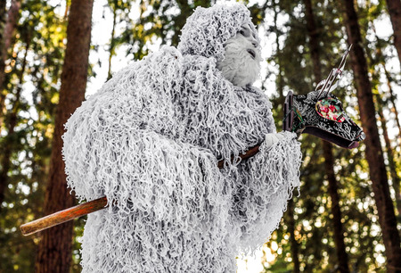 Yeti fairy tale character in winter forest. Outdoor fantasy photo.の写真素材