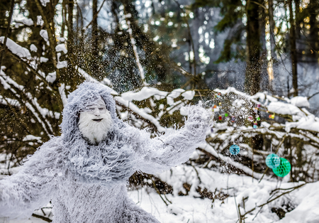 Yeti fairy tale character in winter forest. Outdoor fantasy photo.の写真素材