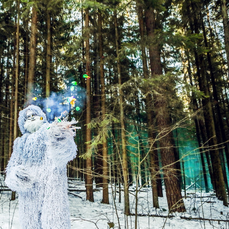 Yeti fairy tale character in winter forest. Outdoor fantasy photo.の写真素材