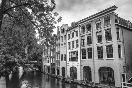 The most famous canals and embankments of Utrecht city during sunset. General view of the cityscape and traditional Netherlands architecture.の写真素材