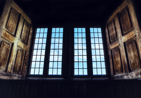 Open window in a dark room.の写真素材