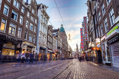 AMSTERDAM, NETHERLANDS - MAY 28, 2017: General view of famous places in Amsterdam city at twilight time. May 28, 2017 in Amsterdam - Netherlands.のeditorial素材
