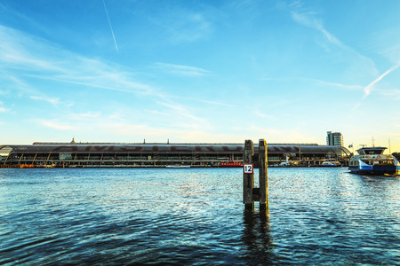 General view of Central station of Amsterdam city at twilight time.のeditorial素材