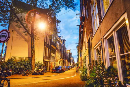 General view of traditional old famous houses and places in Amsterdam city.のeditorial素材