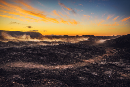 Volcanic fields covered with lava and rock. Picturesque Icelandic landscape.の写真素材
