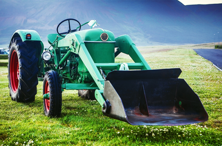 Ancient Icelandic tractor. Retro agriculture machinery.