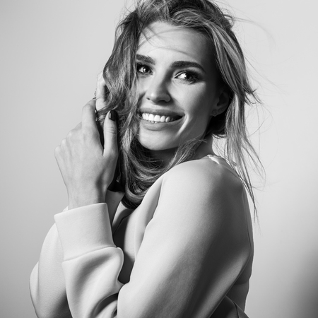 Young sensual model woman pose in studio. Black-white.の写真素材