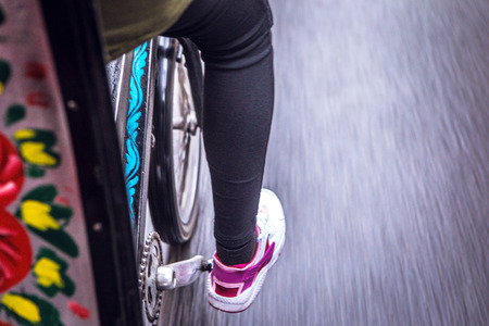 Girl rickshaw riding a bicycle in the center of Paris.の写真素材