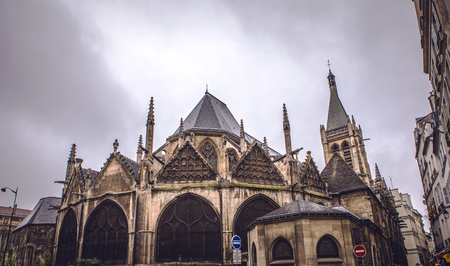 PARIS, FRANCE - NOVEMBER 11, 2017: Famous places and buildings of Paris at rainy autumn evening on...