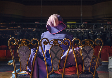 Actor dressed historical costume in interior of old theater.の写真素材