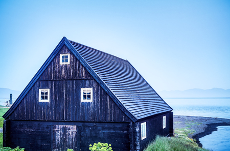 Traditional Icelandic village with houses and beautiful morning landscape.のeditorial素材
