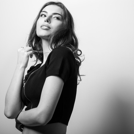 Black-white studio portrait of beautiful young girl.の写真素材