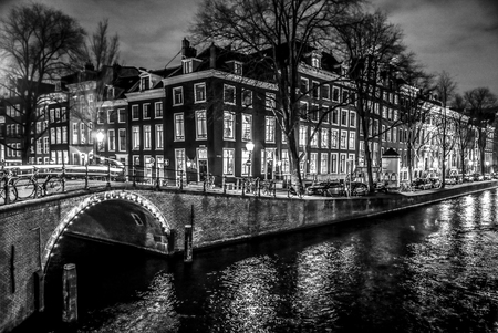 AMSTERDAM, NETHERLANDS - JANUARY 11, 2017: Beautiful night city canals of Amsterdam. January 11, 2017 in Amsterdam - Netherland.のeditorial素材