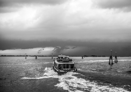 VENICE, ITALY - AUGUST 19, 2016: View on the cityscape of Grand Canal against storm clouds a day before occurred earthquakes in the country on August 19, 2016 in Venice, Italy.のeditorial素材