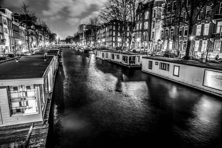 AMSTERDAM, NETHERLANDS - JANUARY 12, 2017: Beautiful night city canals of Amsterdam. January 12, 2017 in Amsterdam - Netherland.のeditorial素材