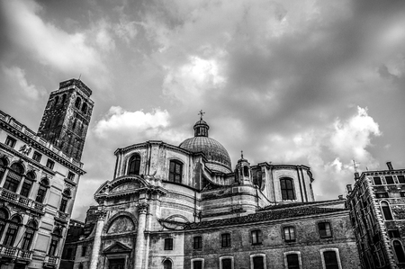 VENICE, ITALY - AUGUST 19, 2016: Famous architectural monuments and facades of old medieval buildings black-white photo. on August 19, 2016 in Venice, Italy.のeditorial素材