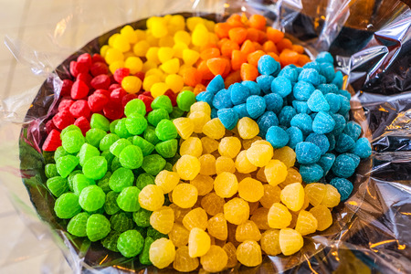 Multicolored candy close-up as background.の写真素材