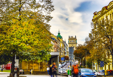 City sights of autumn Prague at day time with beautiful blue cloudy sky.のeditorial素材