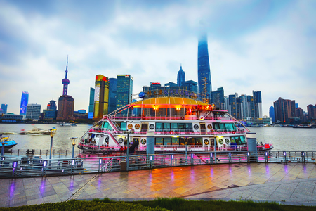 SHANGHAI, Ð¡HINA - APRIL 02, 2019: Heart of Shanghai - popular view of high-rise buildings from...