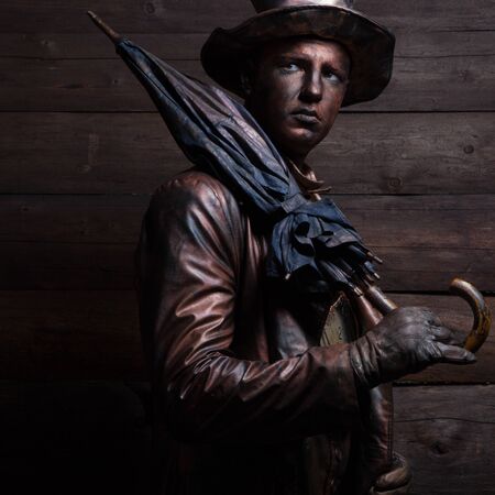 Stylized magic character of fairytale bronze watch repairer.の写真素材