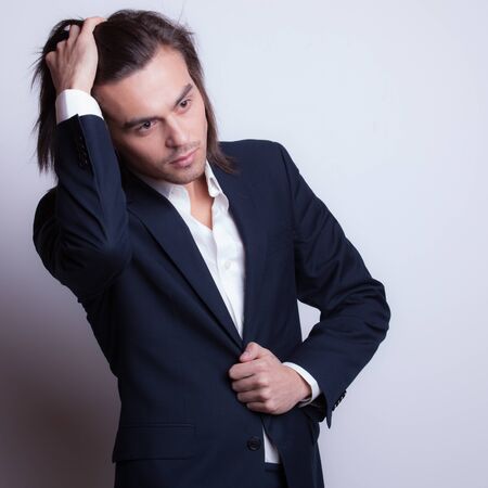 Handsome young elegant man studio portrait.の写真素材