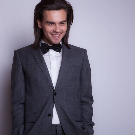 Handsome young elegant man studio portrait.の写真素材