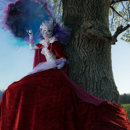 Fairy tale woman on stilts in bright fantasy stylization.の写真素材