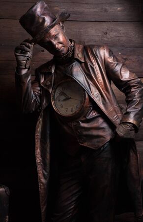 Stylized magic character of fairytale bronze watch repairer.の写真素材