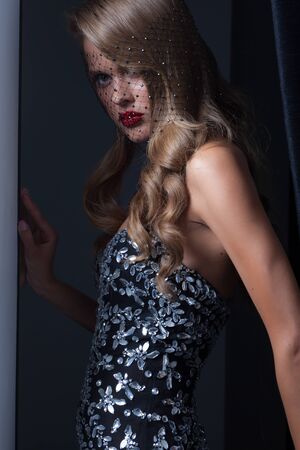 Young beautiful stylish girl in modern interior.の写真素材
