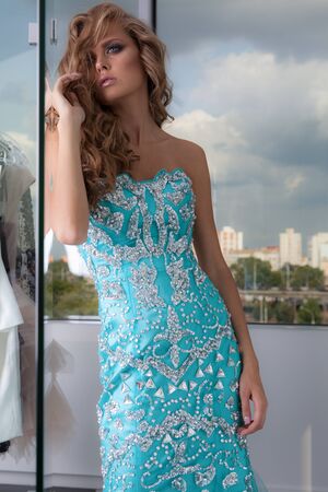 Young beautiful stylish girl in modern interior.の写真素材