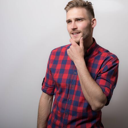Handsome young elegant man studio portrait.の写真素材