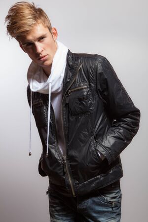 Handsome young elegant man studio portrait.の写真素材