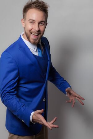 Handsome young elegant man studio portrait.の写真素材