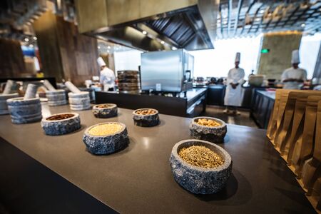 BEIJING, Ð¡HINA - JUNE 01, 2019: Traditional preparing food and professional Chinese cooks at kitchenのeditorial素材