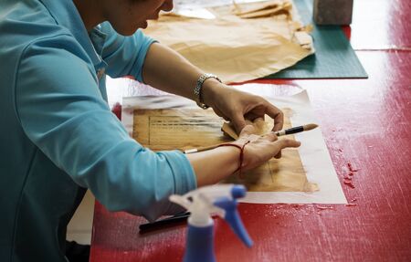 BEIJING, Ð¡HINA - JUNE 01, 2019: Traditional Chinese book and calligraphy restorer laboratory....